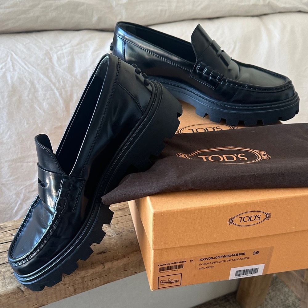 Tod's Glossy Black Leather Loafers